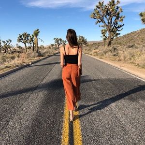 Flared burnt orange pants with belt S